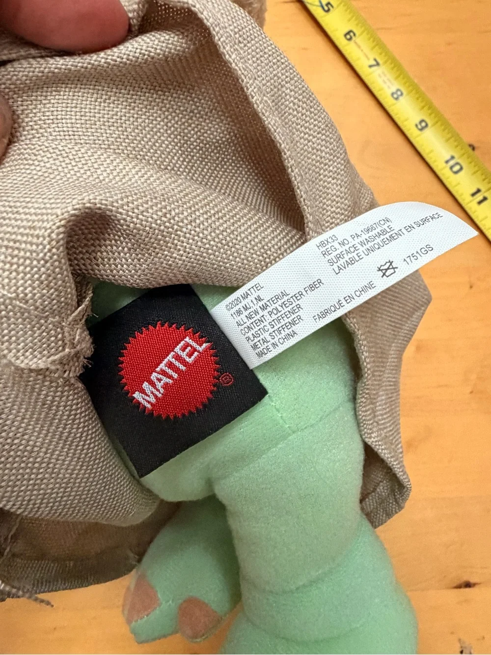 Mattel Green Plush Character Doll with Tan Coat
